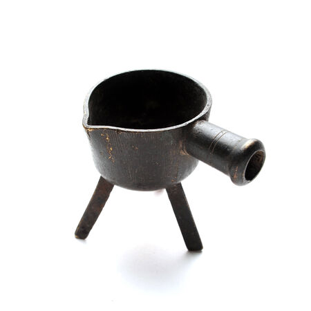 Old form for melting iron at white の写真素材