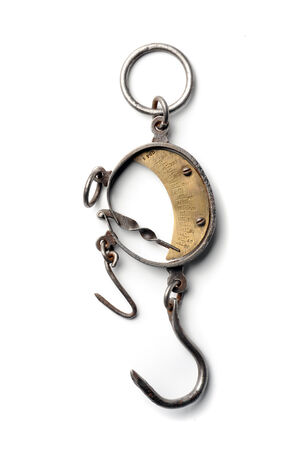 Vintage scales with hook balancing at white の写真素材