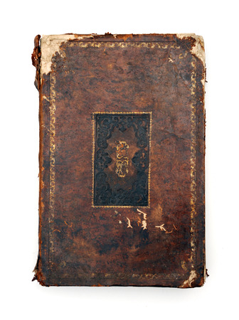 Vintage dog-eared book isolated at whiteの写真素材