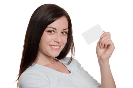 Closeup portrait of pretty girl holding blank business cardの写真素材