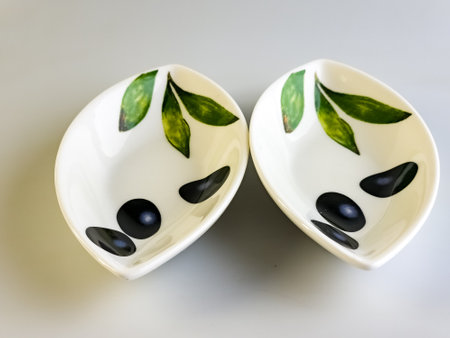 Two special ceramic containers for olives on a white background.の写真素材