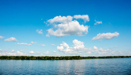 Panoramic view of the Dnieper river bank from the embankment of the city of Dnieper. Reflection of...