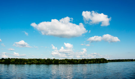 Panoramic view of the Monastery Island on the Dnieper River. Dnieper City. Ukraine. Reflection of...