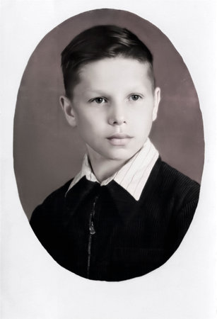 Vintage portrait of a ten-year-old Soviet boy. Retro photo from 1953.