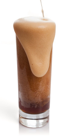 Transparet glass with kvass drink and froth