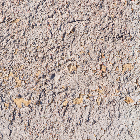 old wall background with cracks plasters