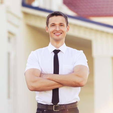 outdoors portrait successful men on background buildingの写真素材