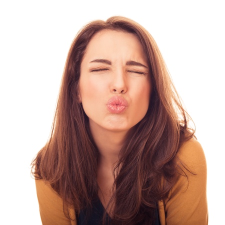 woman kiss on camera. bright emotional portrait in studioの写真素材