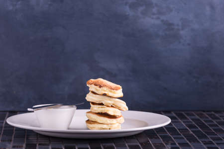 Pancakes on dish. Place for your text. Background with Copy spaceの写真素材