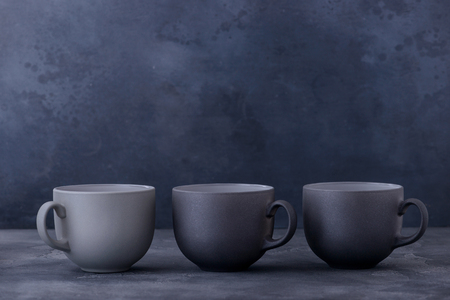 Three ceramic coffee cups. Copy space for textの写真素材