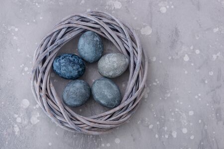 Easter background: eggs in stone style with copy spaceの写真素材