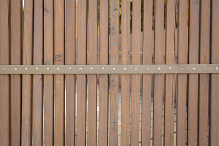 wooden fence made of vertical boards, wooden fence,の写真素材
