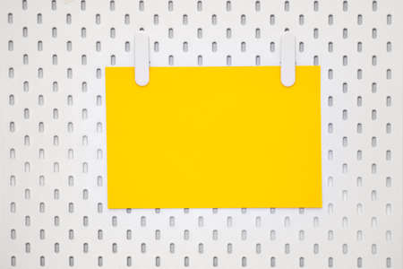 blank yellow paper sheet on notice board, stationery board with letterhead, new page,の写真素材