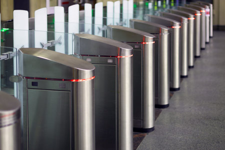 Turnstiles at the entrance a metro or railway station, automatic ticket gate, Automatic ticket...