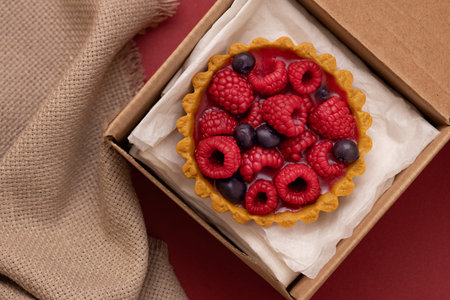 takeaway food, food delivery, dessert with fresh berries in a box, ready-made food delivery service
