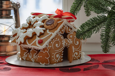 beautiful handmade gingerbread house with snow for Christmas and New Year,の写真素材