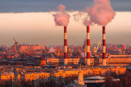 Smoke from the pipes of heat station - St.Petersburg.の写真素材