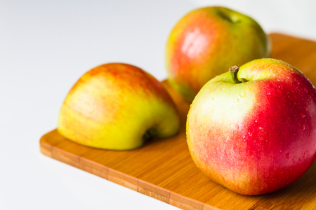 Idared Fresh apples on a cutting board.の写真素材