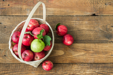 Variants of red and green apples in baskets.の写真素材