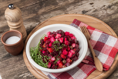Fresh homemade Beetroot salad Vinaigrette in a white bowl. Traditional Russian food.の写真素材