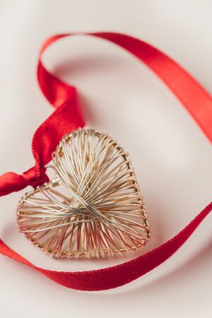 St. Valentine's day heart and red tapes.の写真素材