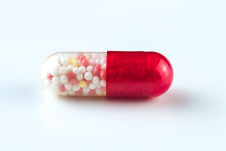 Medical capsules on a white background. Close up.の写真素材