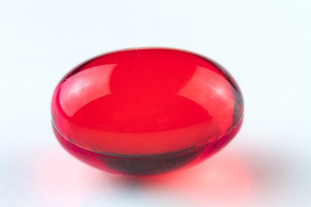 Medical capsules on a white background. Close up.の写真素材