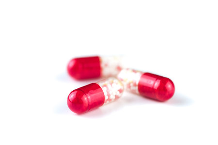 Medical capsules on a white background. Close up.