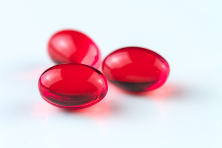 Medical capsules on a white background. Close up.の写真素材