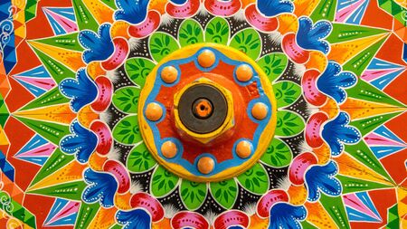 Painted wooden wheel from a traditional Costa Rican ox cartの写真素材