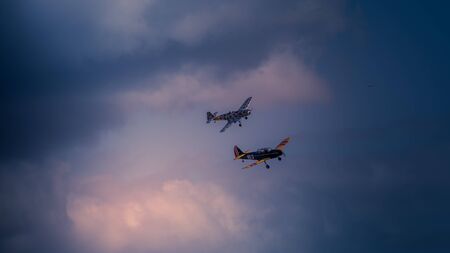 Airplanes in stormy sky at Melun villaroche airshowの写真素材