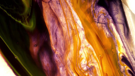 Multicolored watercolor abstract background, hand-drawn. Texture of yellow, orange, purple and purple multicolored spots and splashesの写真素材