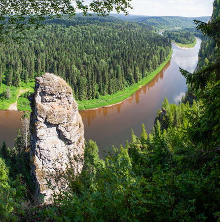 The picturesque Devil's Finger rock overlooking the Usva River. Massif Usvinskie Pillars. Perm Territory. Russiaの写真素材