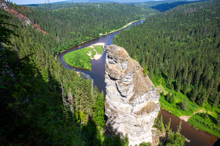 The picturesque Devil's Finger rock overlooking the Usva River. Massif Usvinskie Pillars. Perm Territory. Russiaの写真素材