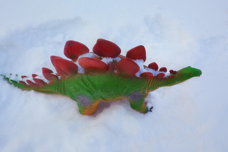 the dinosaur in the snow top viewの写真素材