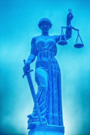 a statue of Justice, the focus is on scalesの写真素材