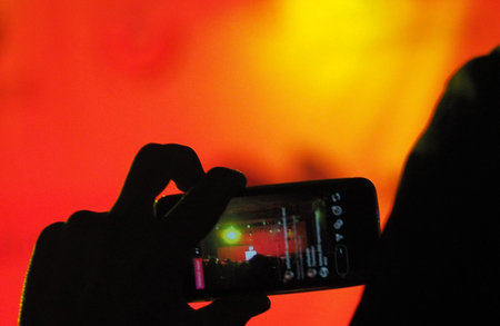 video recording on a smartphone at a concert