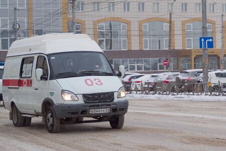 Krasnoyarsk/Russia-05 Dec 2017: ambulance car on a city street on a winter dayのeditorial素材