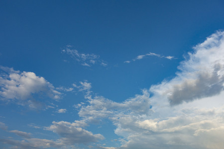 clouds in the blue sky at sunset.の写真素材