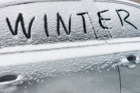 frozen glass of a car on a winter day.の写真素材