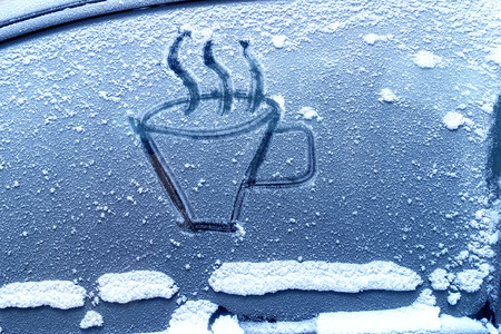 frozen glass of a car on a winter day.の写真素材