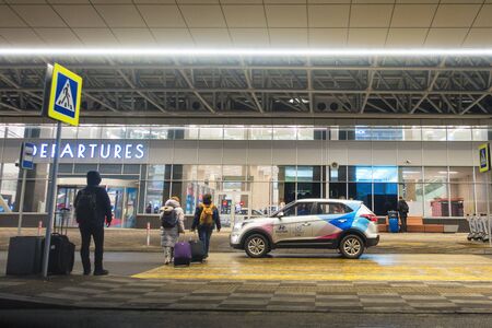 Krasnoyarsk, Russia-March 13, 2019: modern airport terminal Emelyanovo at nightのeditorial素材