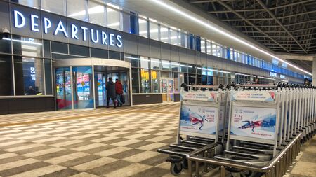 Krasnoyarsk, Russia-March 13, 2019: modern airport terminal Emelyanovo at nightのeditorial素材