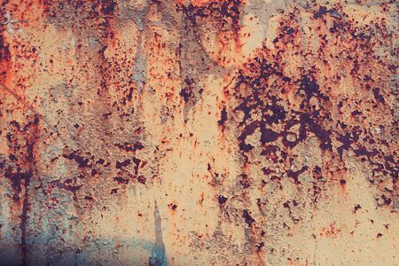 iron surface is covered with old paint texture background.の写真素材