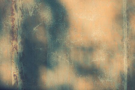 iron surface is covered with old paint texture backgroundの写真素材