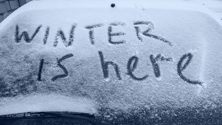 the windshield of the car in the snow, winter weather.の写真素材