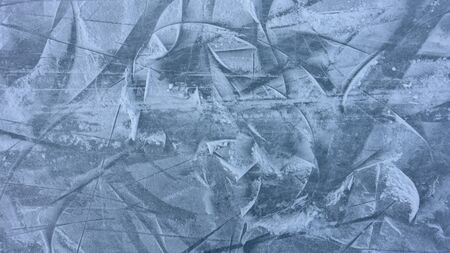 patterns on the surface of ice and snow, winter concept.の写真素材
