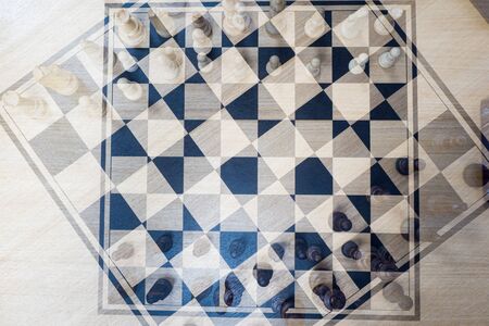 abstract chess background with wooden figures.の写真素材