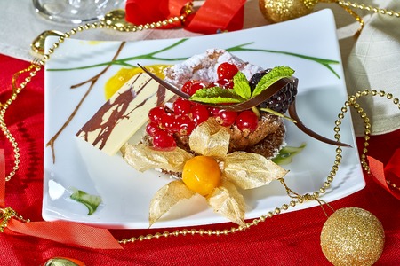 Cupcake with fresh fresh berries decoration on the tableの写真素材