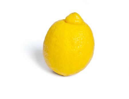 Fresh ripe lemon yellow slanted on a white background with shadowの写真素材